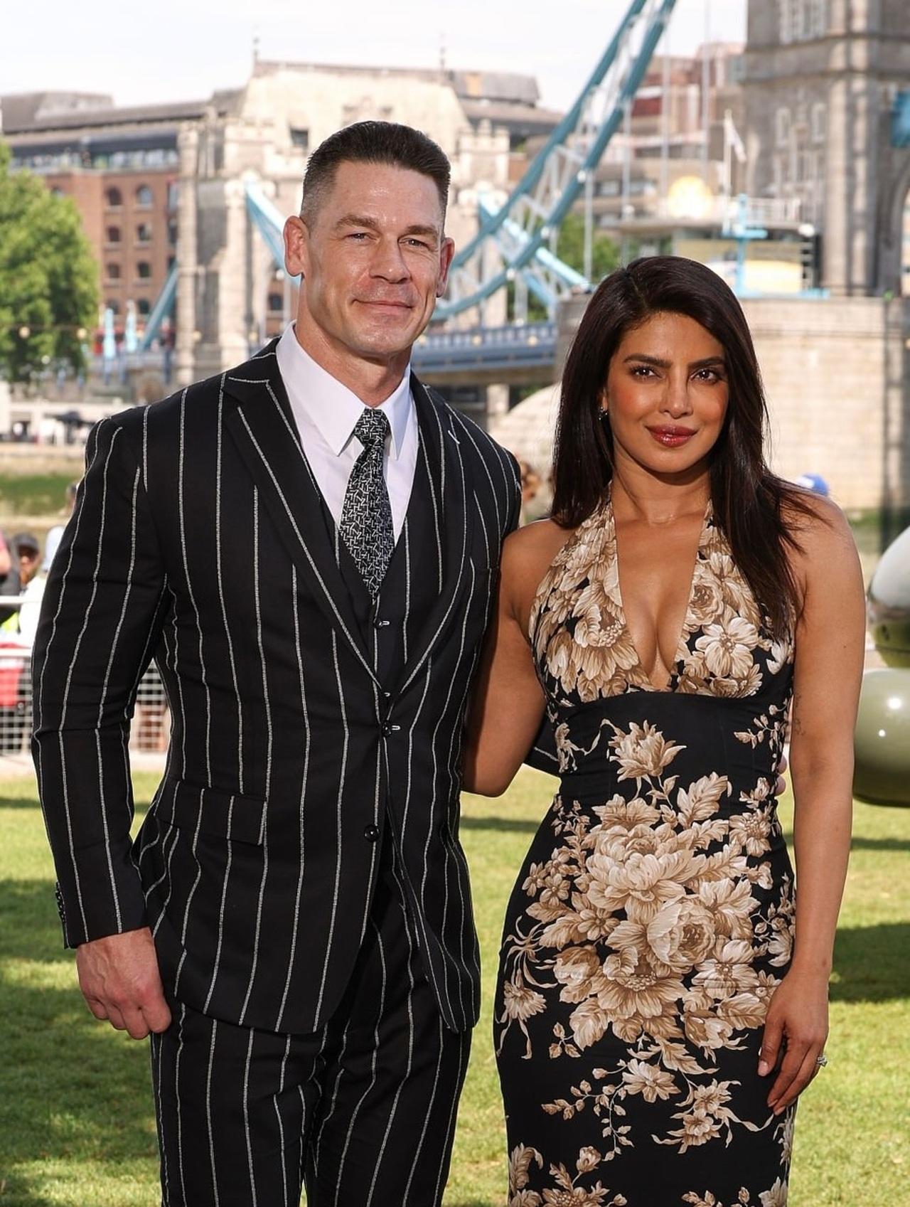 The fitted silhouette highlights her curves, while delicate accessories and fresh, natural makeup keep the look relaxed and fresh for a daytime event